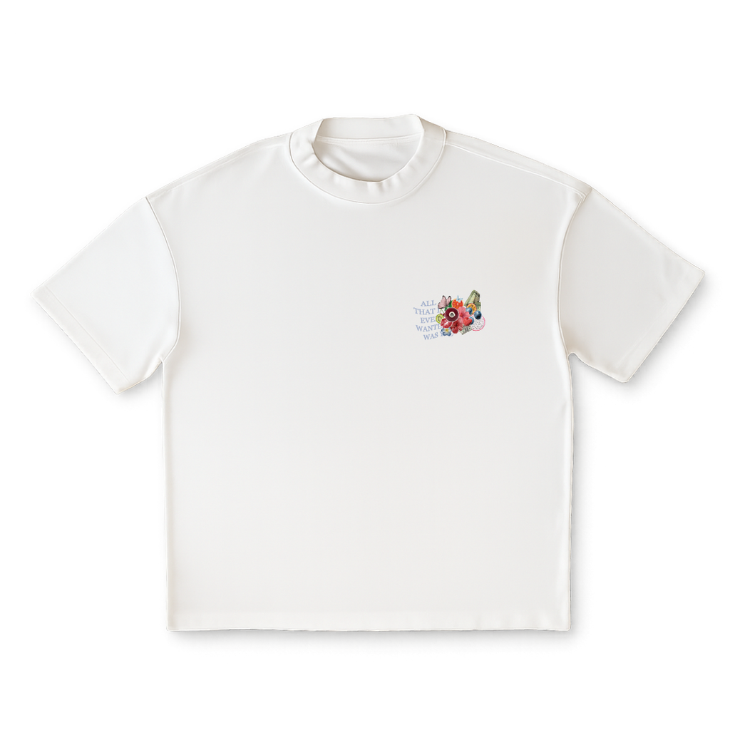 White t-shirt with a colorful floral design on a clear background