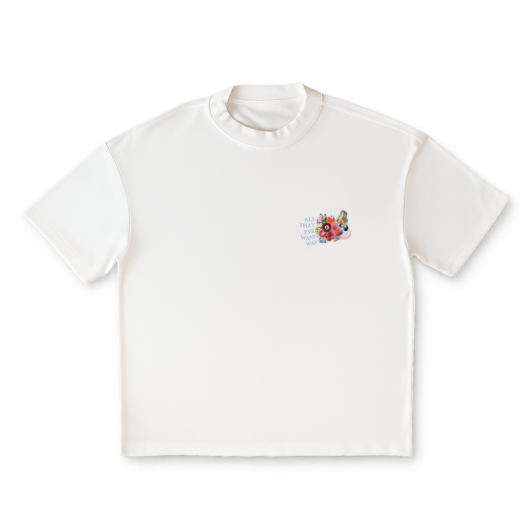 White t-shirt with a colorful floral design on a clear background